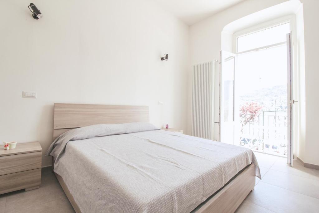Postel nebo postele na pokoji v ubytování Appartamento ai Portici Sampietro