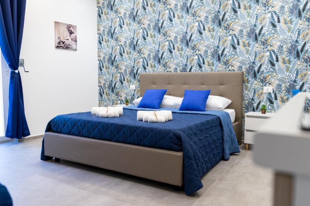 Postel nebo postele na pokoji v ubytování Bed & Breakfast Le Mura