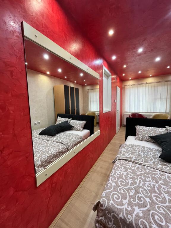 Postel nebo postele na pokoji v ubytování Apartmani Tomašević