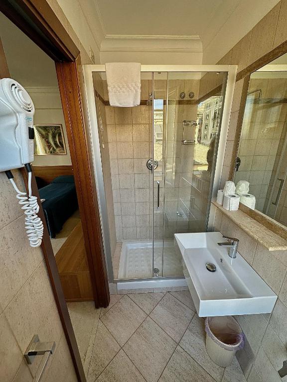 Koupelna v ubytování Hotel Principe Di Piemonte