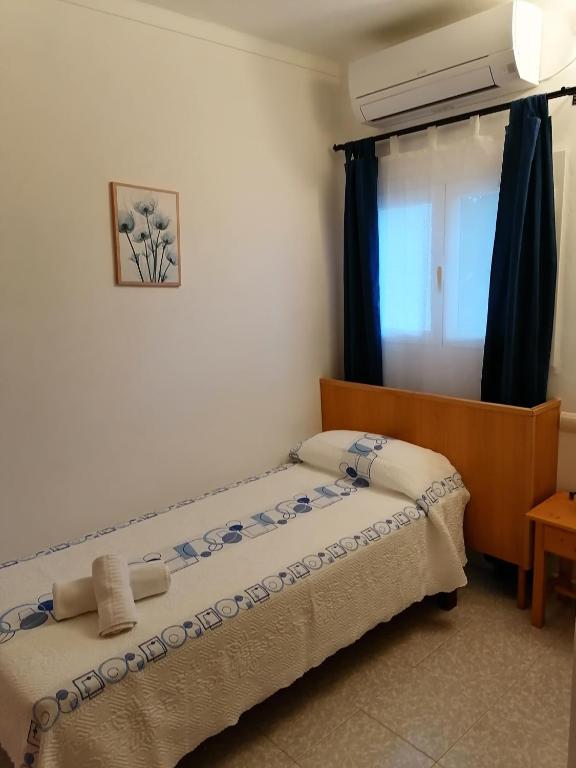Postel nebo postele na pokoji v ubytování Hostal Pepe