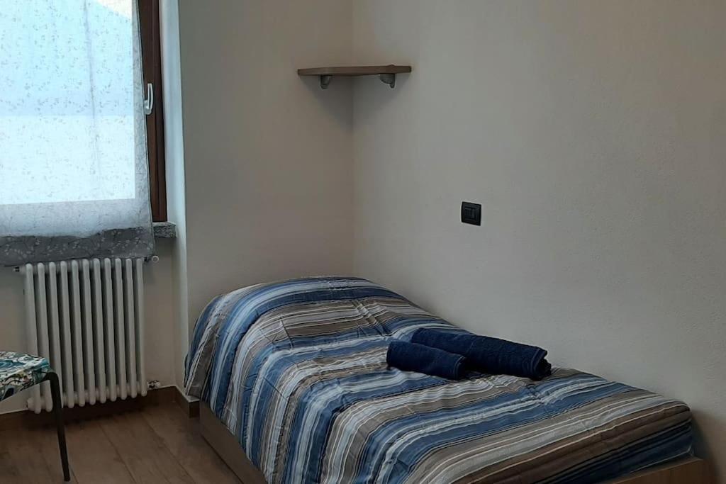 Postel nebo postele na pokoji v ubytování Cima Lago