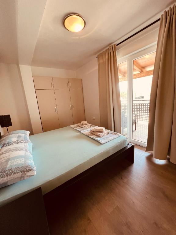 A bed or beds in a room at Apartman Bijeca - Medulin