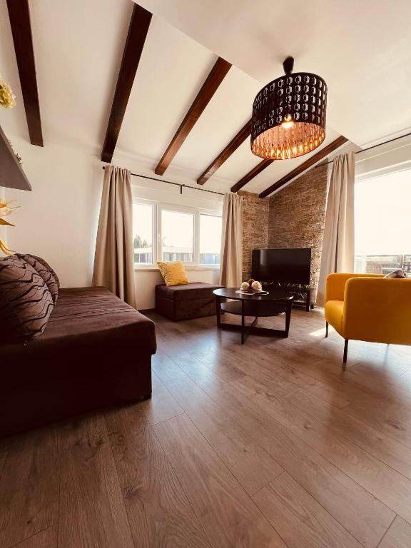 A seating area at Apartman Bijeca - Medulin