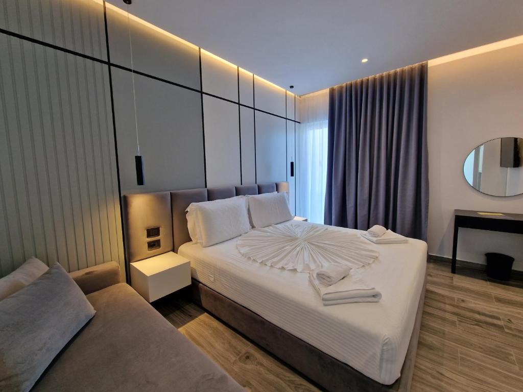 Postel nebo postele na pokoji v ubytování ADMIRO Hotel