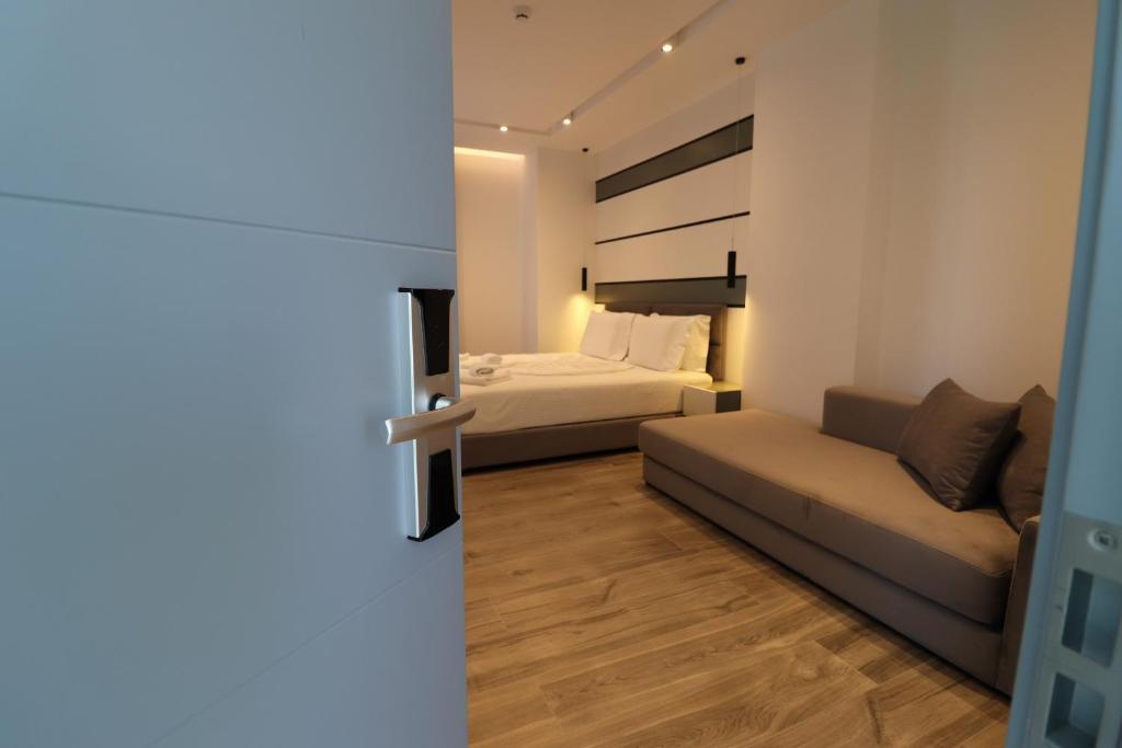 Postel nebo postele na pokoji v ubytování ADMIRO Hotel