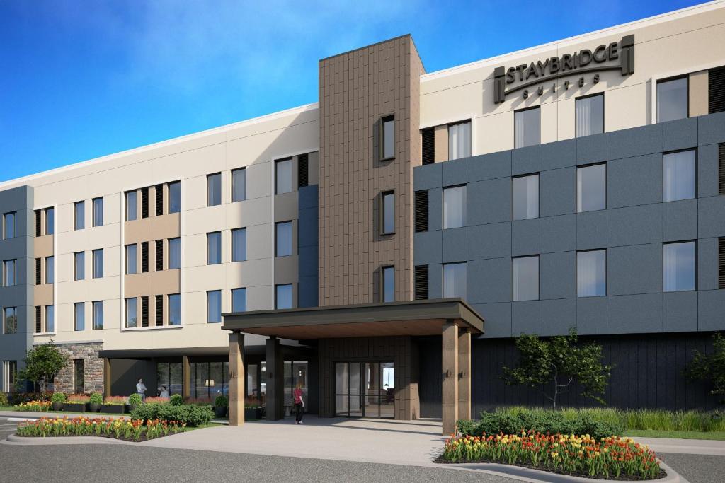 eine Darstellung der Vorderseite eines Hotels in der Unterkunft Staybridge Suites Sacramento Woodland, an IHG Hotel in Woodland