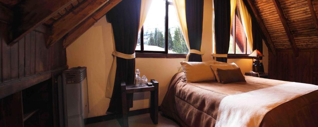 Postel nebo postele na pokoji v ubytování Hacienda Hostería Dos Chorreras