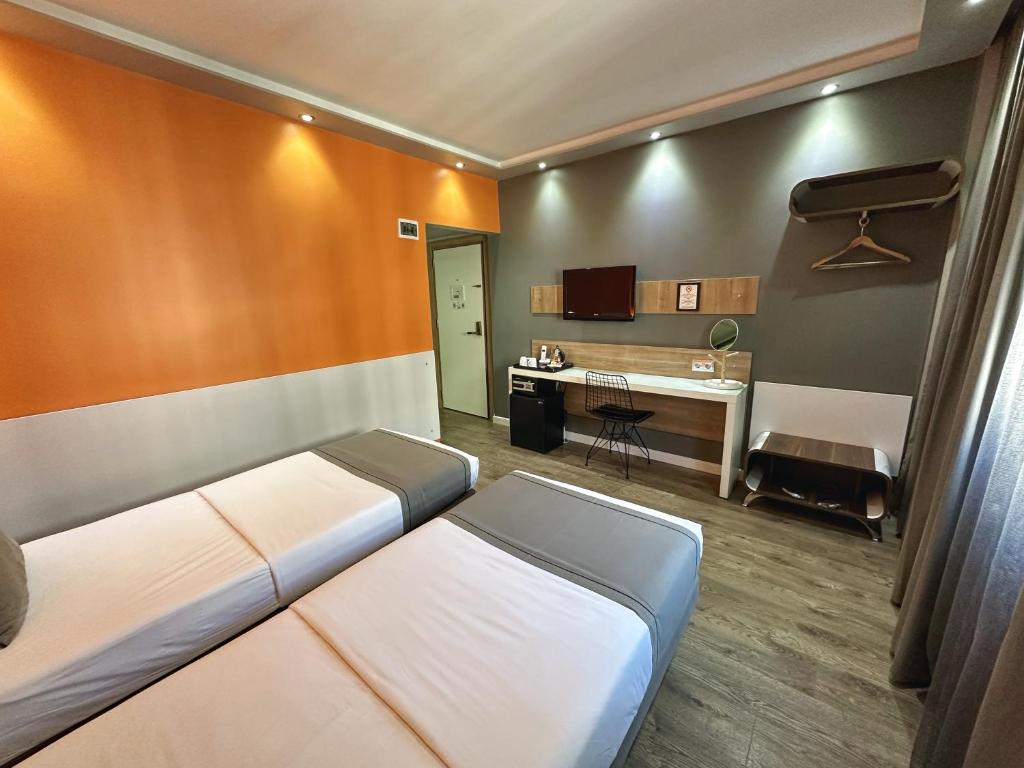 Kuchyň nebo kuchyňský kout v ubytování My Dora Hotel