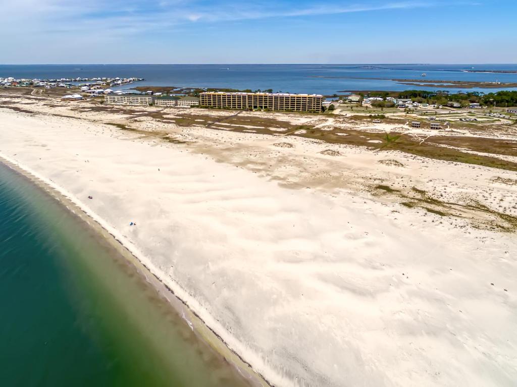 an aerial view of the beach and the ocean at Holiday Isle 221 in Dauphin Island