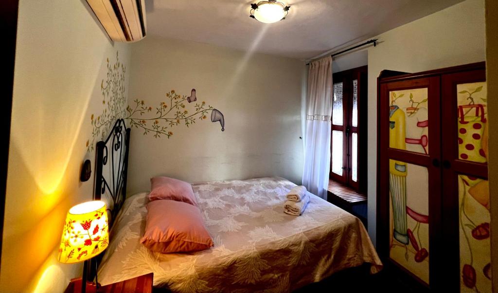 Postel nebo postele na pokoji v ubytování Deluxe Plaza de Santiago - 3 hab