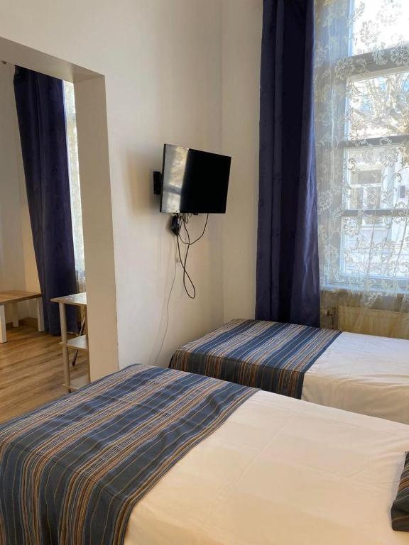 Postel nebo postele na pokoji v ubytování Aquamarine Hotel - Lauluväljak