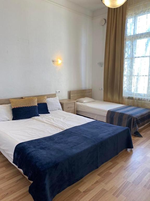 Postel nebo postele na pokoji v ubytování Aquamarine Hotel - Lauluväljak