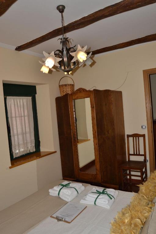 Posteľ alebo postele v izbe v ubytovaní Casa Rural El Corredor en Cabornera de Gordón