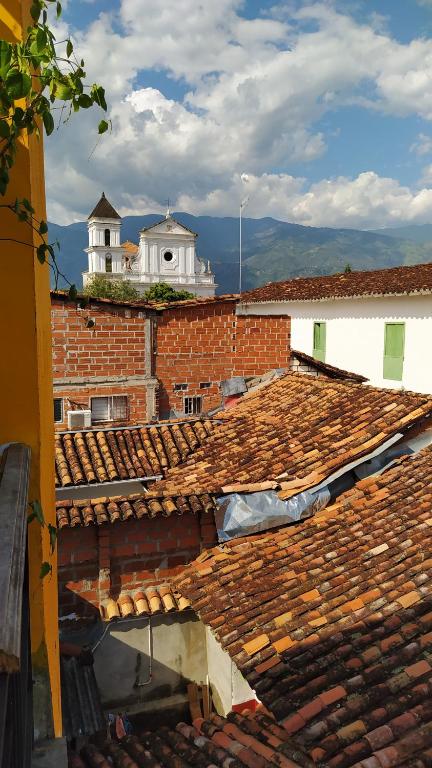 a view of the roofs of a brick building at HOTEL CASCADA PLAZA in Santa Fe de Antioquia