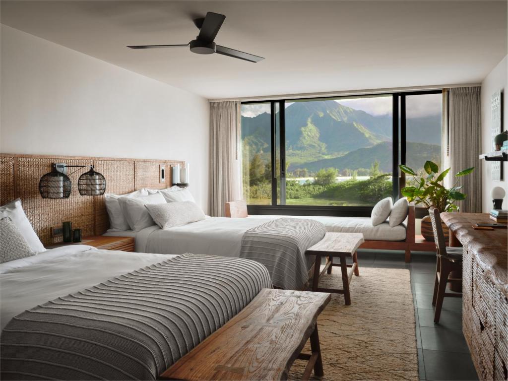 Postel nebo postele na pokoji v ubytování 1 Hotel Hanalei Bay