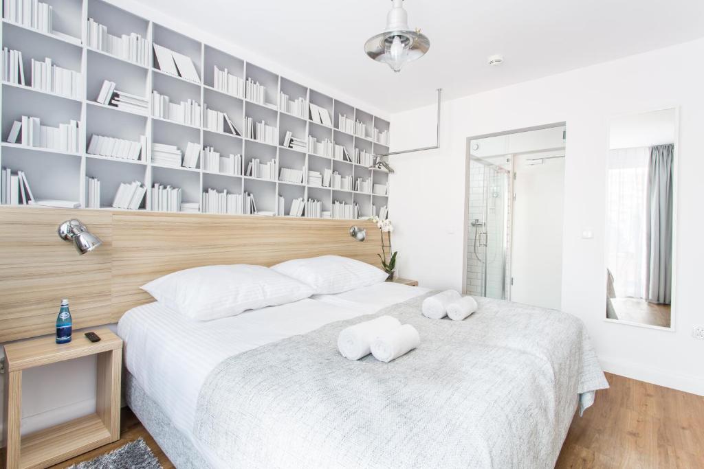 Posteľ alebo postele v izbe v ubytovaní Smart Hotel