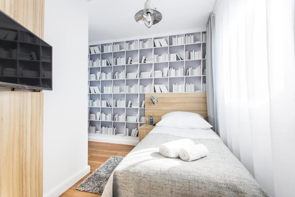 Posteľ alebo postele v izbe v ubytovaní Smart Hotel