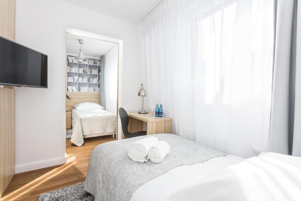 Posteľ alebo postele v izbe v ubytovaní Smart Hotel