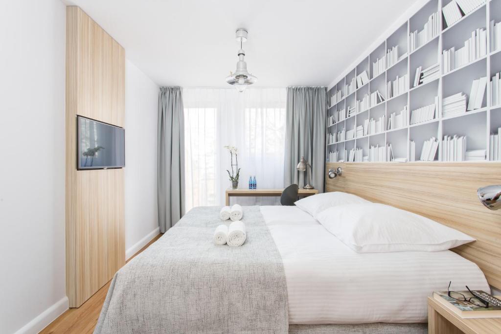 Posteľ alebo postele v izbe v ubytovaní Smart Hotel