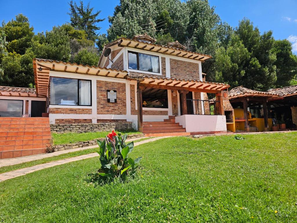 Κήπος έξω από το Rancho Nuevo - Ecoturismo - Cascadas la Periquera