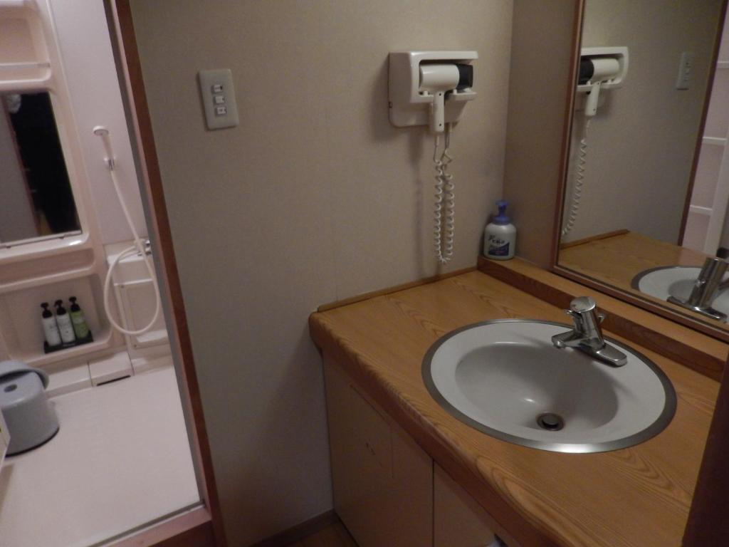 Koupelna v ubytování Hotel Daisen Shirogane