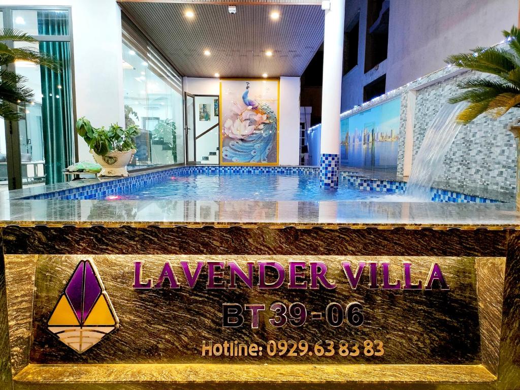 a sign for the lobby of a luxury hotel at Villa FLC Sam Son Lavender in Sầm Sơn