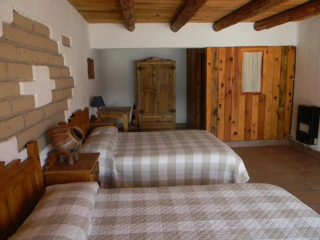 Postel nebo postele na pokoji v ubytování La Troje de Adobe