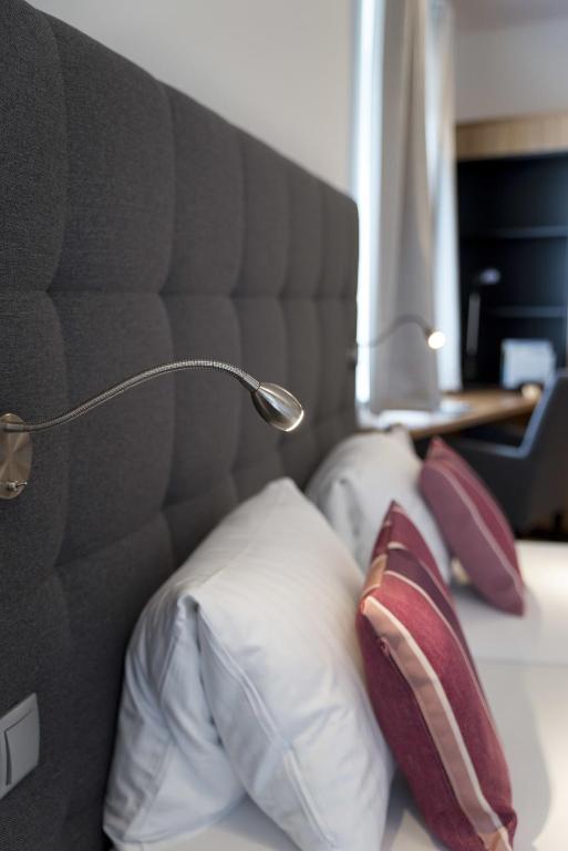 Postel nebo postele na pokoji v ubytování Hotel Locker & Legere