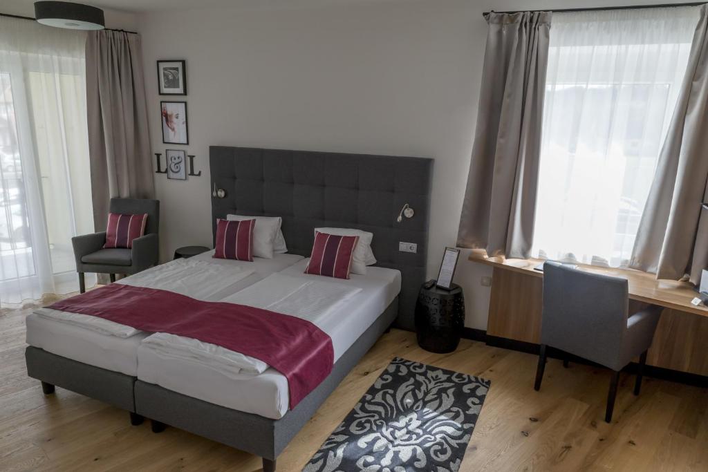 Postel nebo postele na pokoji v ubytování Hotel Locker & Legere