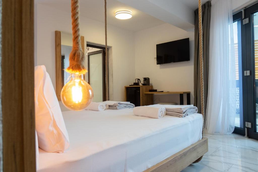 Postel nebo postele na pokoji v ubytování Avaton Luxury Resort and Spa Access the Enigma - Adults Only & Kids 14 Plus-