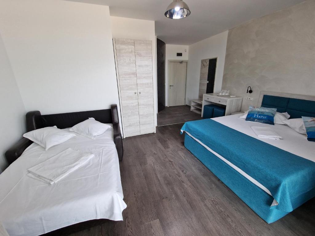 Postel nebo postele na pokoji v ubytování Hotel H pe plaja Belona