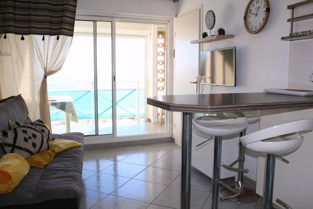 Area soggiorno di T1 Cabine 4 couchages vue mer !