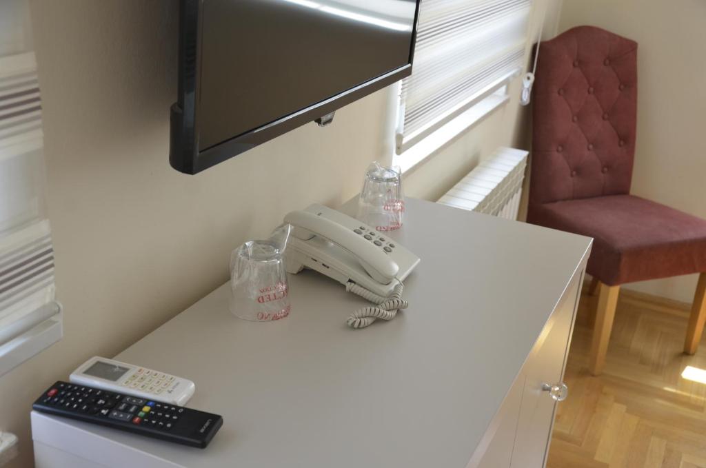 TV a/nebo společenská místnost v ubytování Hotel Drina Premium