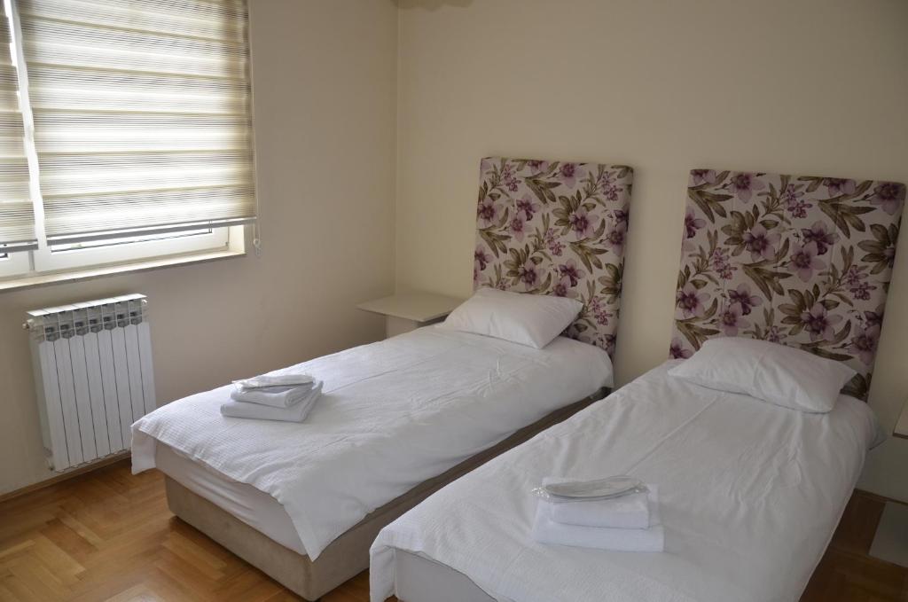Postel nebo postele na pokoji v ubytování Hotel Drina Premium