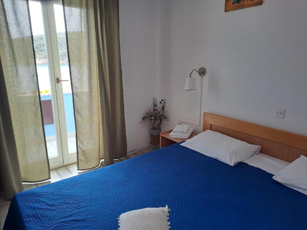 Postel nebo postele na pokoji v ubytování Sobe MaMaLu