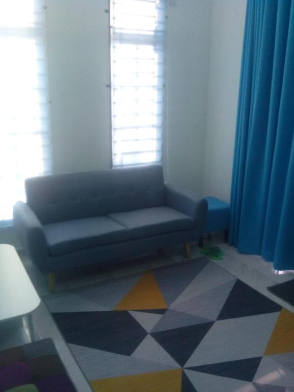 Posezení v ubytování Homestay Adilah B