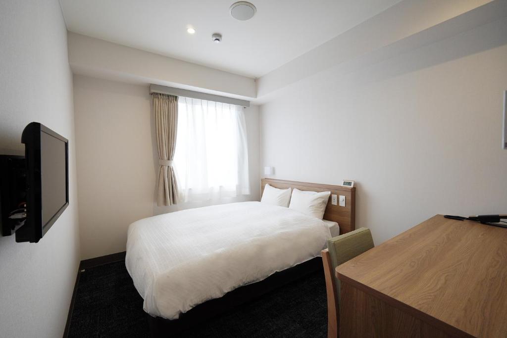 TV a/nebo společenská místnost v ubytování Matsue New Urban Hotel