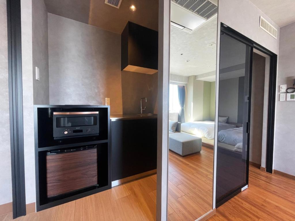 Kuchyň nebo kuchyňský kout v ubytování Matsue New Urban Hotel