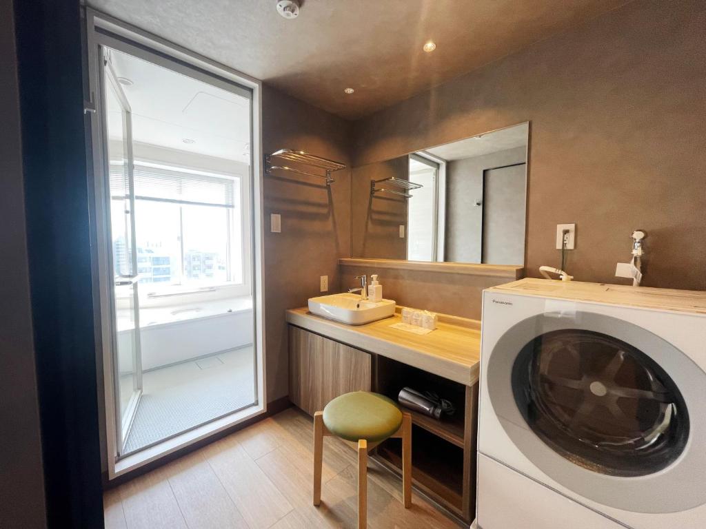 Kuchyň nebo kuchyňský kout v ubytování Matsue New Urban Hotel