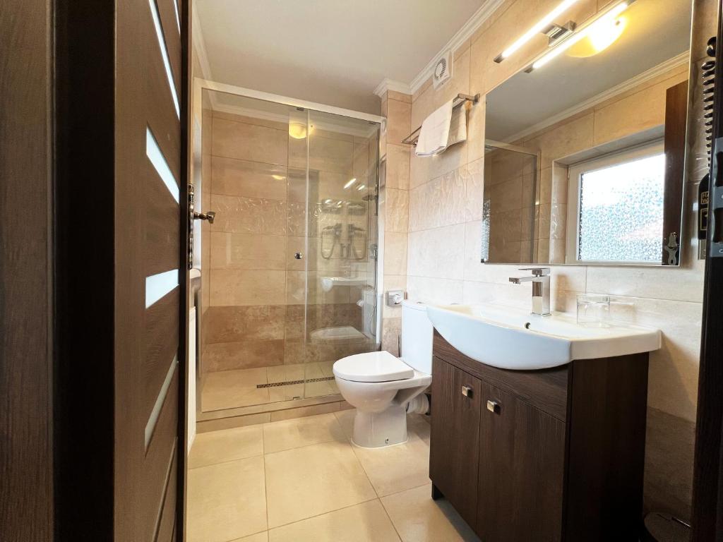 Koupelna v ubytování Hotel Gundl Alm