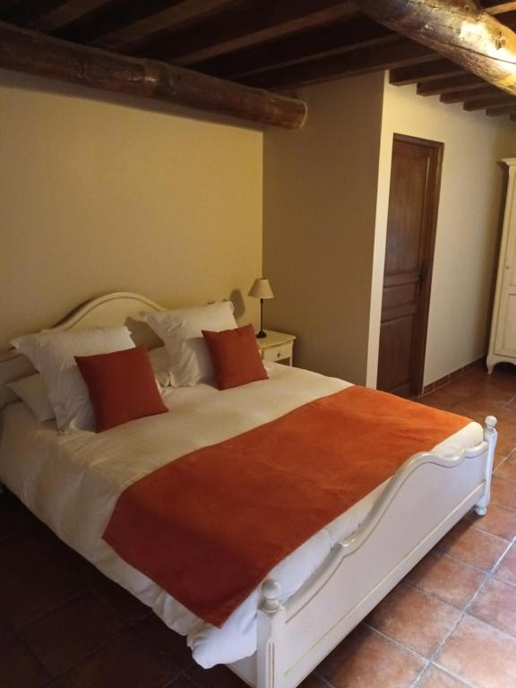 Postel nebo postele na pokoji v ubytování Le Vieux Moulin de Jouques