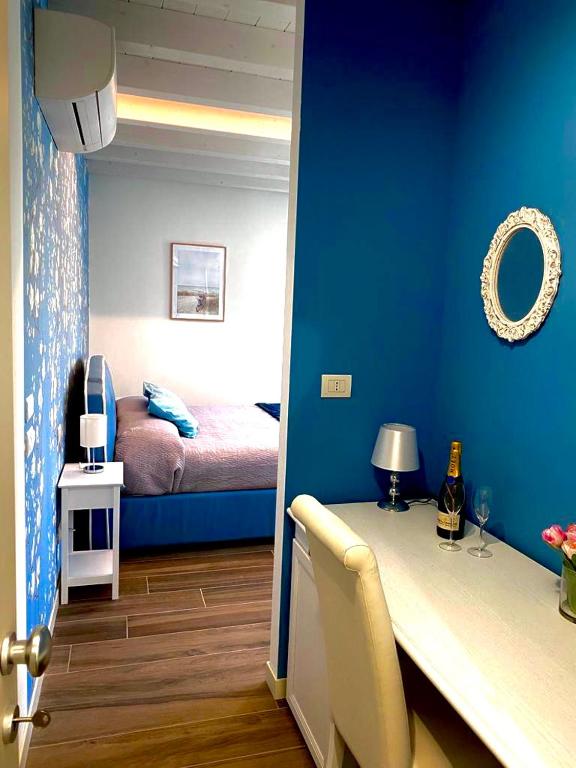 Postel nebo postele na pokoji v ubytování Star Soave Rooms - Locazione Turistica