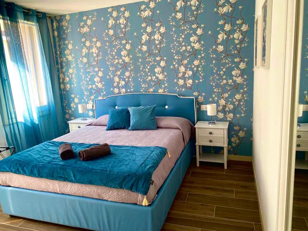 Postel nebo postele na pokoji v ubytování Star Soave Rooms - Locazione Turistica