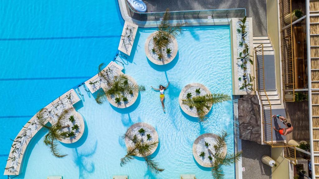 an overhead view of a swimming pool at a resort at Liberty Hotels Lara in Lara
