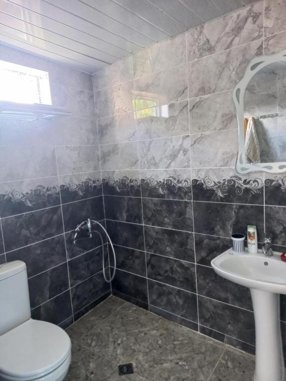 Koupelna v ubytování Guest House IRAKLI