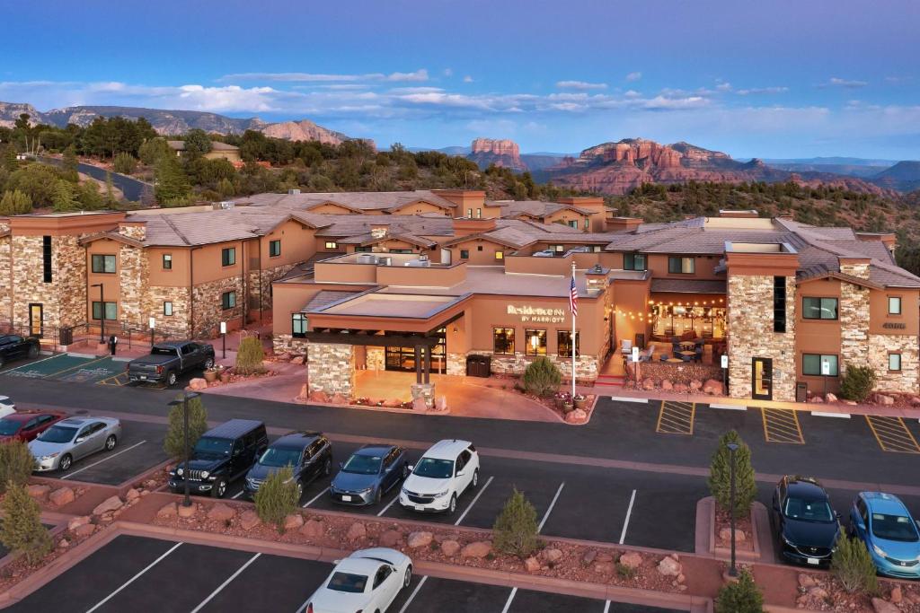 an aerial view of a hotel with cars parked in a parking lot at Residence Inn by Marriott Sedona in Sedona