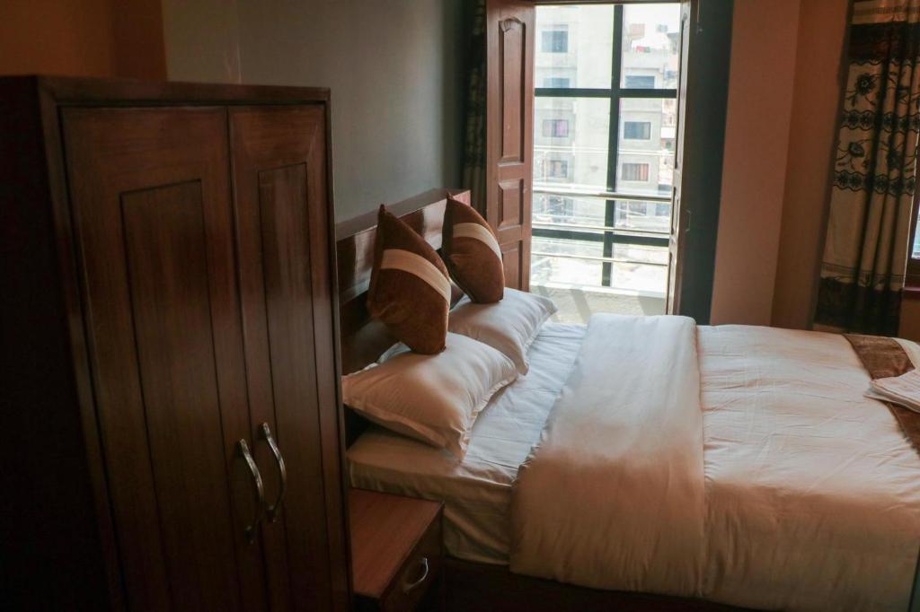 Postel nebo postele na pokoji v ubytování Harry's Home