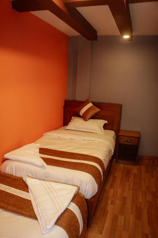 Postel nebo postele na pokoji v ubytování Harry's Home