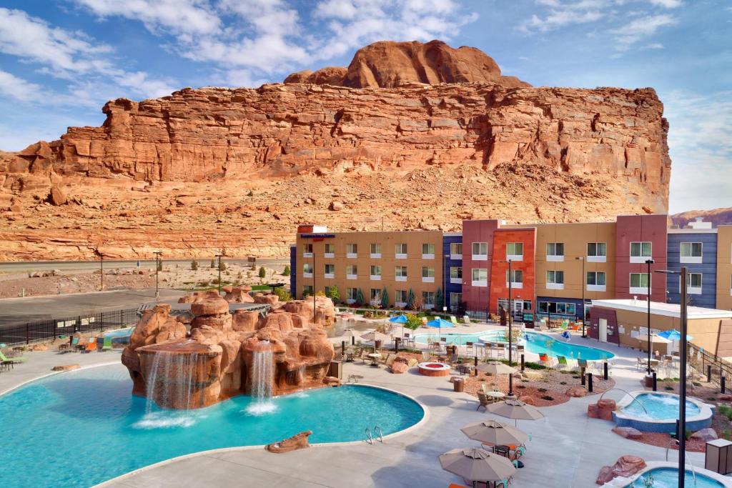a view of a resort with a mountain in the background at Fairfield Inn & Suites by Marriott Moab in Moab